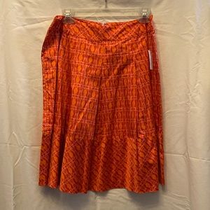 Skirt, cones and few inches below knees.